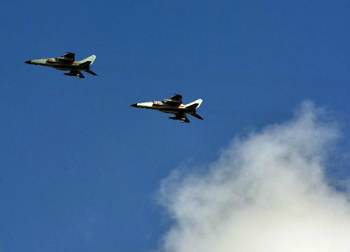 Aviões chineses fazem exibição (AFP, Mark Ralston)