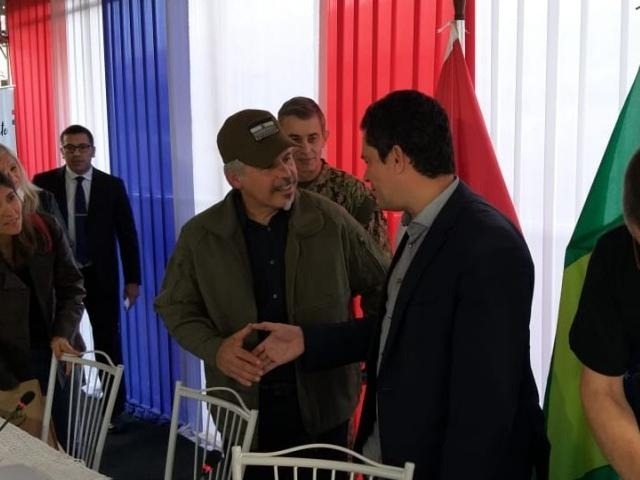 Confiscar bens de traficantes é medida mais eficiente, diz Sérgio Moro Sérgio Moro cumprimenta o ministro da Senad Arnaldo Giuzzio (de boné), hoje em Pedro Juan Caballero (Foto: Porã News)