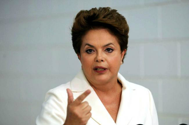 Dilma passa o facão no orçamento Dilma passa o facão no orçamento