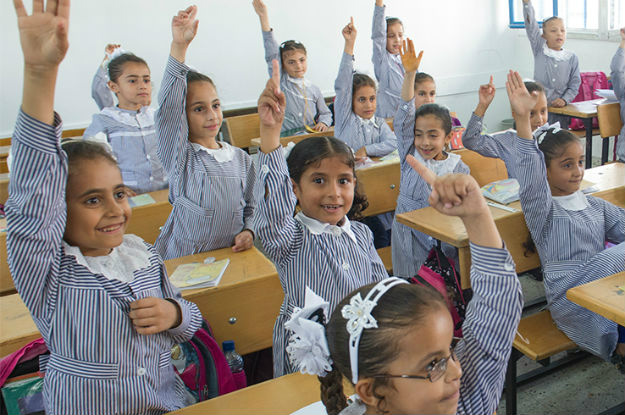 Estudantes em sala de aula em campo de refugiados na Faixa de GazaFoto: Divulgação