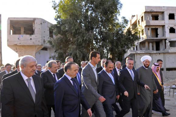 Antes de trégua, Assad promete reconquistar 'toda a Síria' Assad visita a cidade de Daraya e promete reconstruir a Síria Agência Lusa/Epa/Sana/Direitos Reservados