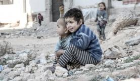 Unicef: violência mata uma criança e um adolescente a cada 7 minutos Crianças sírias perto de um abrigo para pessoas deslocadas