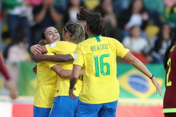 Brasil se classifica para fase final da Copa América de futebol feminino A atacante Marta comemora seu gol na vitória por 4 a 0 contra a VenezuelaCBF/Direitos reservados