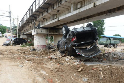 Enchentes e tempestades em Pequim provocaram 77 mortes, segundo novo balanço