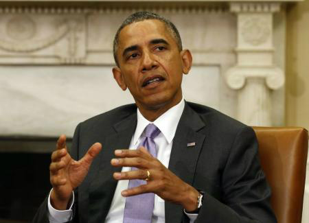 O presidente dos Estados Unidos, Barack Obama, fala no Salão Oval da Casa Branca, em Washington, nesta quinta-feira. 12/06/2014 