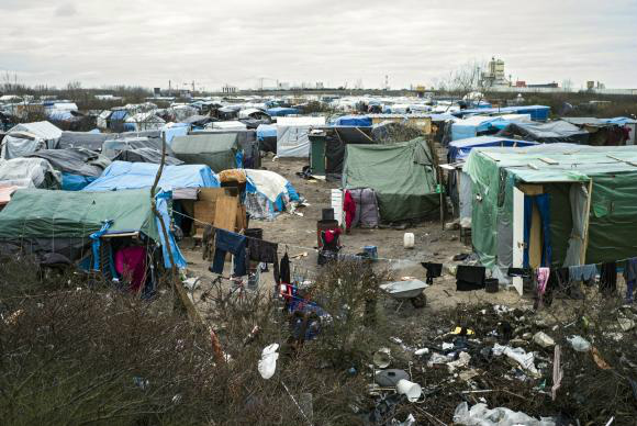 Retirada de imigrantes do campo de Calais começa com tranquilidade A parte sul do campo de refugiados em Calais, conhecido como Jungle -Yoan Valat/Agência Lusa
