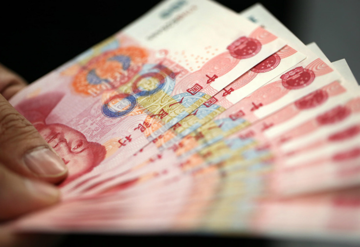 Bolsa de Xangai fecha em baixa Yuan; moeda chinesa