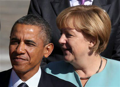 Obama e Merkel na cimeira do G20 em setembro, em Sampetersburgo | Fotografia © Reuters