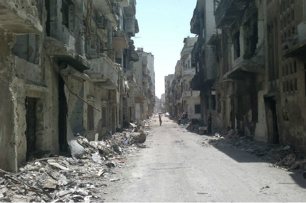 Prédios destruídos na cidade antiga em Homs, na Síria. Foto: Unicef/Nasar Ali