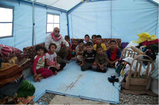 Uma família no Campo de Sheikhan, perto de Dohuk – Kurdistan region of Iraq, Foto: Ocha/Charlotte Cans