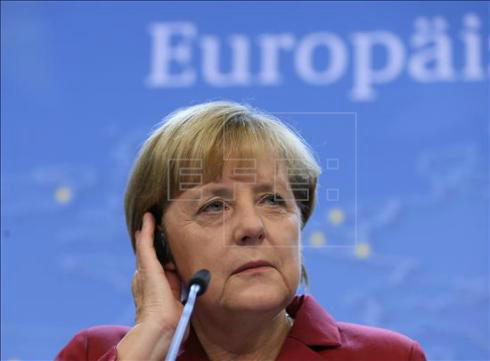 A chanceler alemã, Angela Merkel, em coletiva de imprensa nesta sexta-feira no primeiro dia de reuniões do Conselho Europeu. EFE
