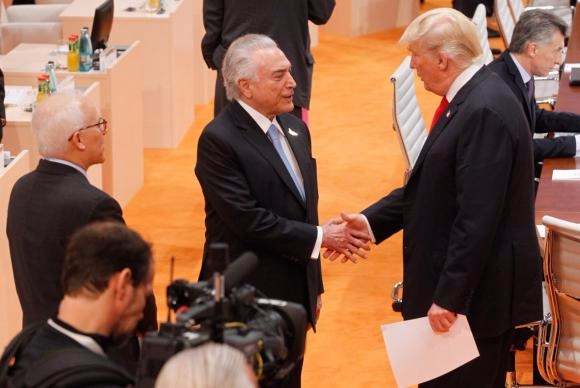 Trump elogiou economia do Brasil O presidente Michel Temer se encontra com Donald Trump, durante a cúpula do G20Divulgação/Twitter do presidente Michel Temer