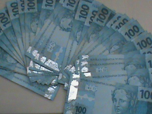 Dinheiro apreendido com líder de quadrilha. (Foto: Divulgação)