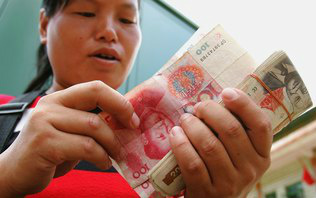 China duplica faixa de variação nas negociações com iuan