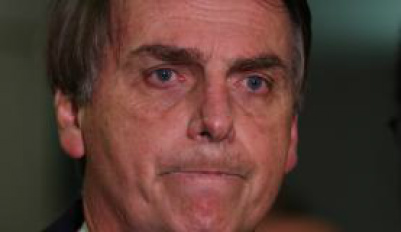 Deputado Jair Bolsonaro fala com a imprensa após ter virado réu no STF pela declaração de que 