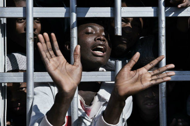 Migrante em centro de detenção na Líbia. Foto: Unicef