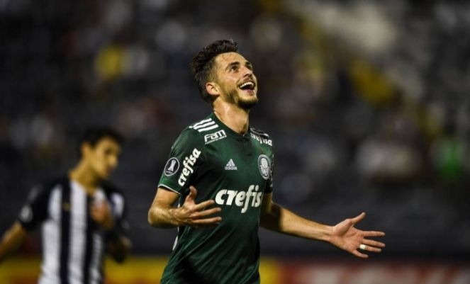 Wilian comemora um dos gols do Palmeiras (Foto: AFP)